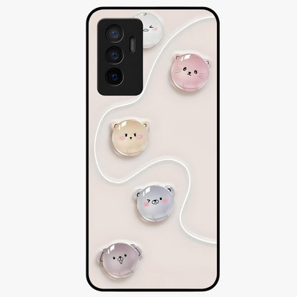 Puffy Face Parade Glass Case showing flat back view with cute puffy character faces artwork and glossy glass finish.
