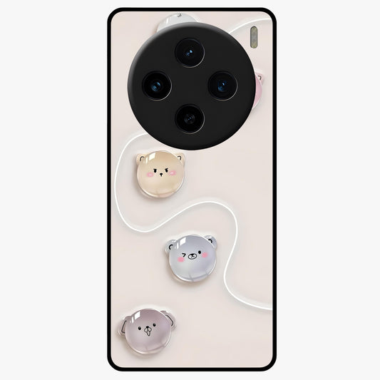 Puffy Face Parade Glass Case showing flat back view with cute puffy character faces artwork and glossy glass finish.