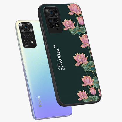 Lotus Bloom Serenity Custom Name Glass Case displayed in angled mockup highlighting graceful lotus illustration with custom name feature.