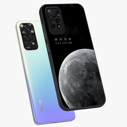 Cosmic Moon Glow Glass Case displayed in angled mockup highlighting celestial moon design with cosmic aesthetic theme.