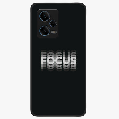 Focus Mode On Glass Case showing flat back view with bold motivational typography design and glossy glass finish.