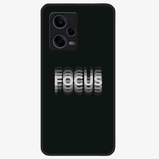 Focus Mode On Glass Case showing flat back view with bold motivational typography design and glossy glass finish.