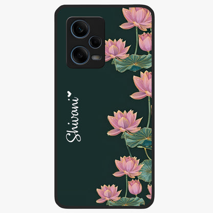 Lotus Bloom Serenity Custom Name Glass Case showing flat back view with elegant lotus flower artwork and personalized name design.