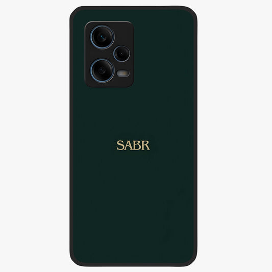 Sabr Minimal Patience Glass Case showing flat back view with minimalist typography artwork and glossy glass finish.