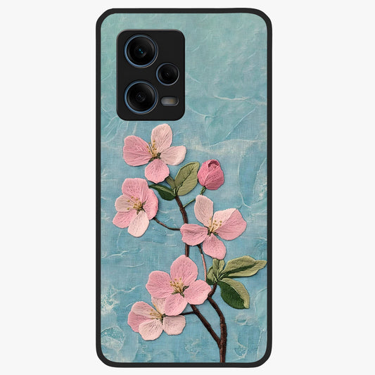 Threaded Blossom Breeze Glass Case showing flat back view with delicate blossom artwork and glossy glass finish.