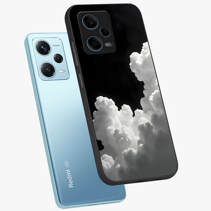 Black Background With White Cloud Glass Case displayed in angled mockup highlighting soft white cloud illustration and minimal design.