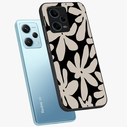 Monochrome Petal Dance Glass Case displayed in angled mockup highlighting elegant petal design with black and white aesthetic.