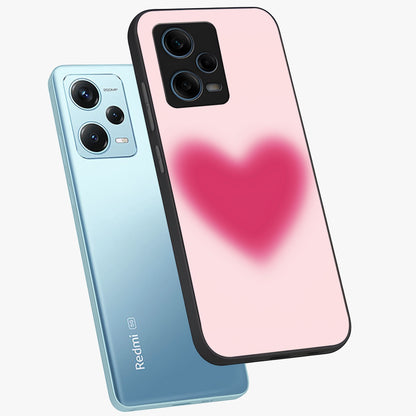 Pink Aura Heart Glass Case displayed in angled mockup highlighting vibrant pink heart design with dreamy aura aesthetic.