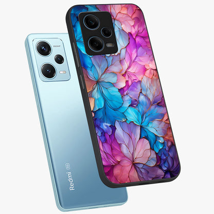 Radiant Floral Whirl Glass Case displayed in angled mockup highlighting vibrant flower pattern with dynamic artistic aesthetic.