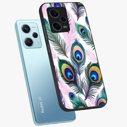 Royal Peacock Feathers Glass Case displayed in angled mockup highlighting vibrant feather pattern with regal aesthetic style.