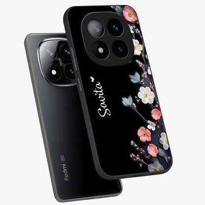 Black Elegance Floral Custom Name Glass Case displayed in angled mockup highlighting dark floral aesthetic and custom name feature.