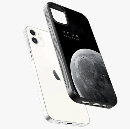Cosmic Moon Glow Glass Case laid diagonally highlighting side profile, edges and glossy glass shine.