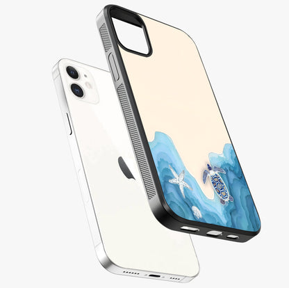 Ocean Drift Turtle Glass Case laid diagonally highlighting side profile, edges and glossy glass shine.