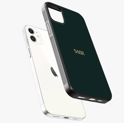Sabr Minimal Patience Glass Case laid diagonally highlighting side profile, edges and glossy glass shine.