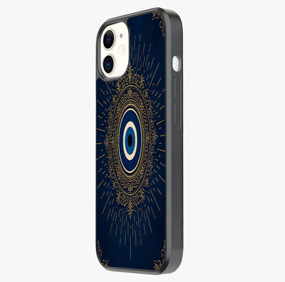 Golden Evil Eye Mandala Glass Case photographed in natural light showing reflective finish and design depth.