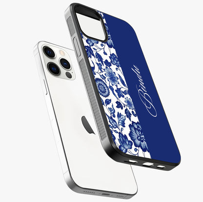 Blue Vintage Floral Pattern Glass Case laid diagonally highlighting side profile, edges and glossy glass shine.