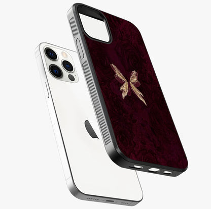 Crimson Fade Butterfly Glass Case laid diagonally highlighting side profile, edges and glossy glass shine.