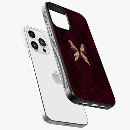 Crimson Fade Butterfly Glass Case laid diagonally highlighting side profile, edges and glossy glass shine.