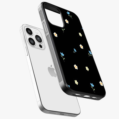 Minimalistic Blue With White Flower Pattern Glass Case laid diagonally highlighting side profile, edges and glossy glass shine.