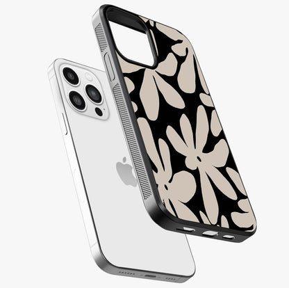 Monochrome Petal Dance Glass Case laid diagonally highlighting side profile, edges and glossy glass shine.