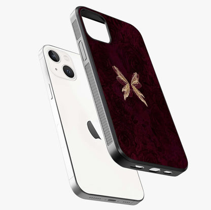 Crimson Fade Butterfly Glass Case laid diagonally highlighting side profile, edges and glossy glass shine.