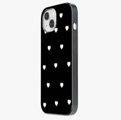 Cute And Simple White Hearts Glass Case photographed in natural light showing reflective finish and design depth.