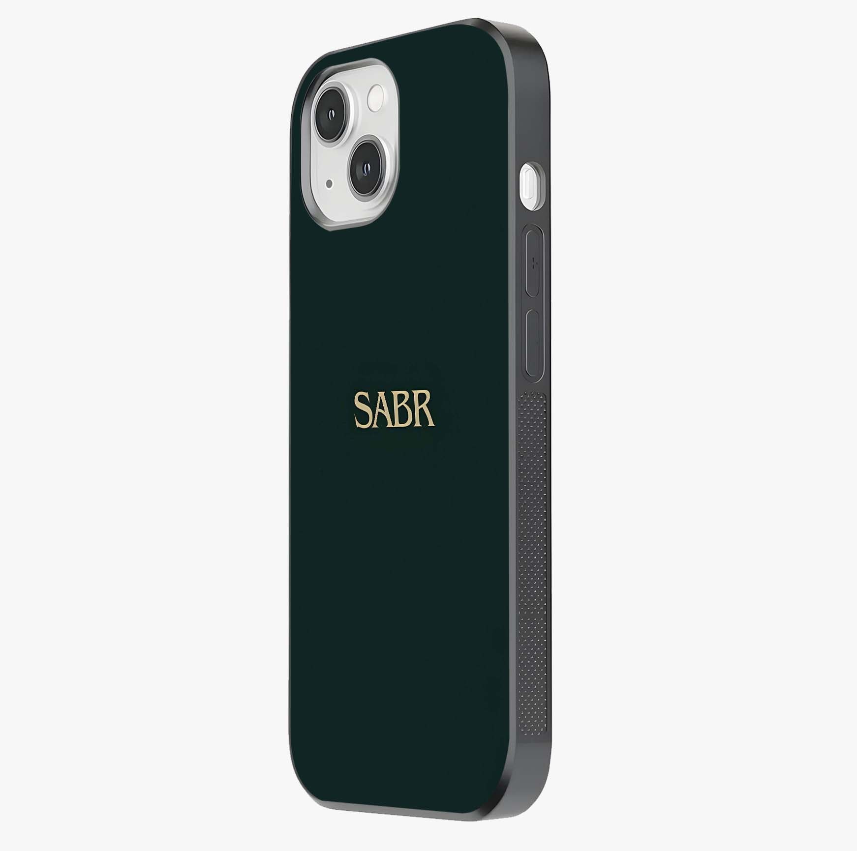Sabr Minimal Patience Glass Case photographed in natural light showing reflective finish and design depth.