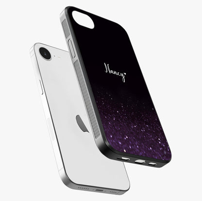 Glittery Purple Bokeh Custom Name Glass Case laid diagonally highlighting side profile, edges and glossy glass shine.
