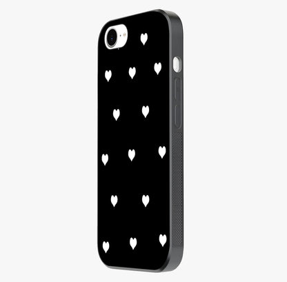Cute And Simple White Hearts Glass Case photographed in natural light showing reflective finish and design depth.