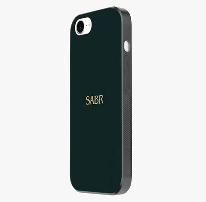 Sabr Minimal Patience Glass Case photographed in natural light showing reflective finish and design depth.