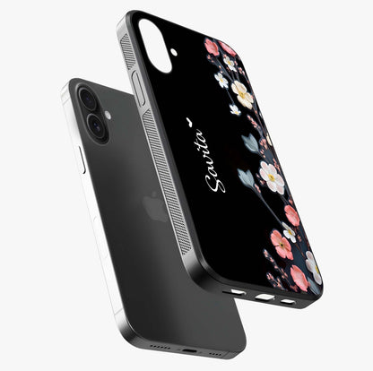 Black Elegance Floral Custom Name Glass Case laid diagonally highlighting side profile, edges and glossy glass shine.