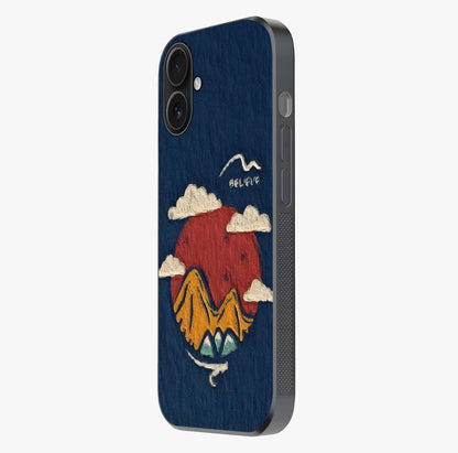 Dream Beyond Mountains Glass Case photographed in natural light showing reflective finish and design depth.
