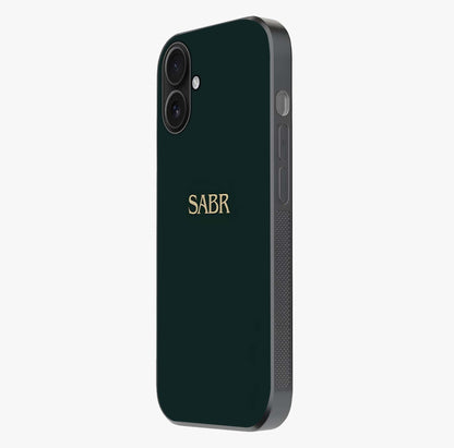 Sabr Minimal Patience Glass Case photographed in natural light showing reflective finish and design depth.