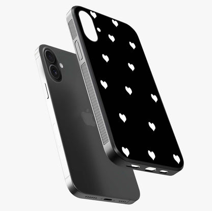 Cute And Simple White Hearts Glass Case laid diagonally highlighting side profile, edges and glossy glass shine.