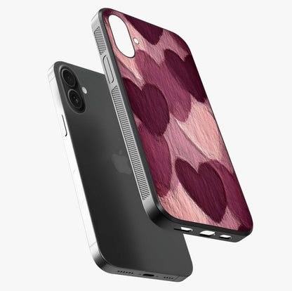Layered Paper Hearts Glass Case laid diagonally highlighting side profile, edges and glossy glass shine.