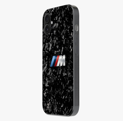 Carbon Speed Mark Glass Case photographed in natural light showing reflective finish and design depth.