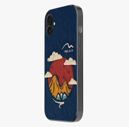 Dream Beyond Mountains Glass Case photographed in natural light showing reflective finish and design depth.