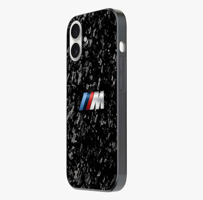 Carbon Speed Mark Glass Case photographed in natural light showing reflective finish and design depth.
