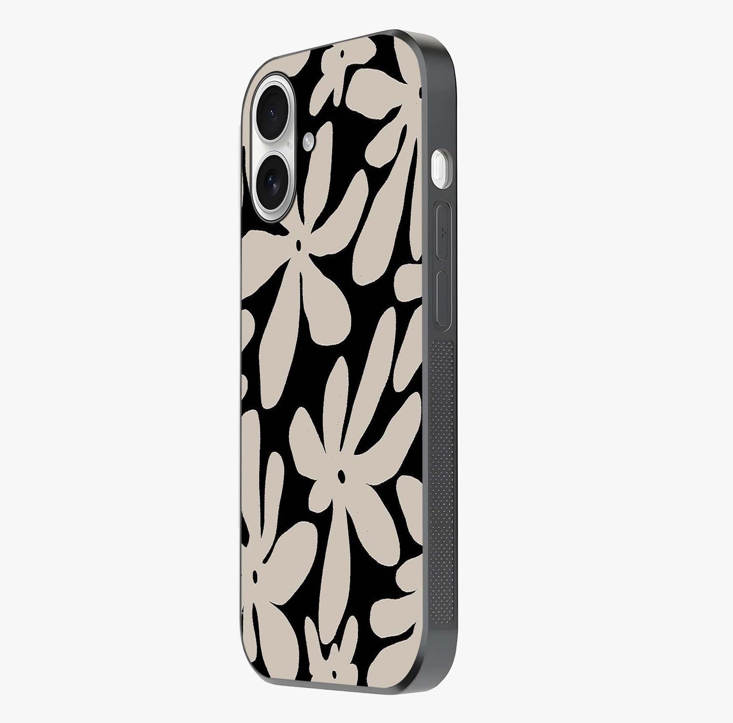Monochrome Petal Dance Glass Case photographed in natural light showing reflective finish and design depth.