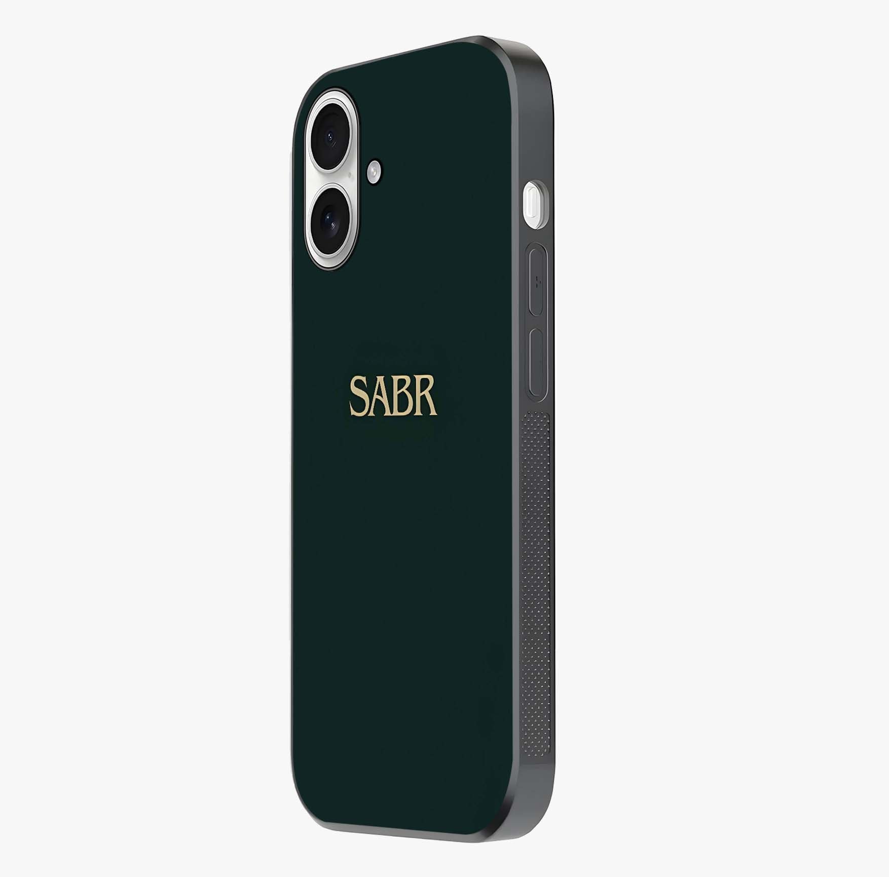 Sabr Minimal Patience Glass Case photographed in natural light showing reflective finish and design depth.