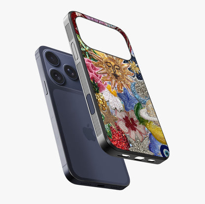Celestial Floral And Playful Glass Case laid diagonally highlighting side profile, edges and glossy glass shine.