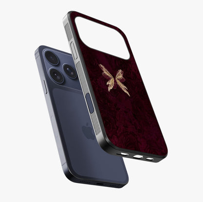 Crimson Fade Butterfly Glass Case laid diagonally highlighting side profile, edges and glossy glass shine.