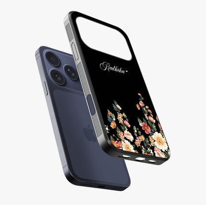 Floral Design With A Custom Personalized Name Glass Case laid diagonally highlighting side profile, edges and glossy glass shine.