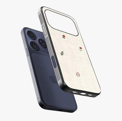 Minimalistic Blue With White Flower Pattern Glass Case laid diagonally highlighting side profile, edges and glossy glass shine.