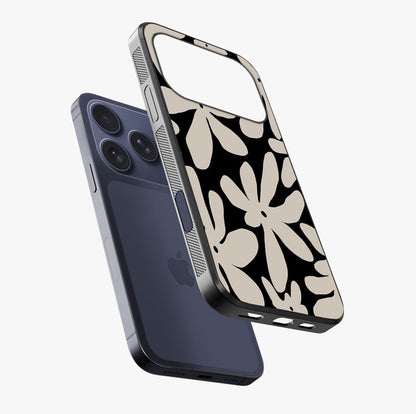 Monochrome Petal Dance Glass Case laid diagonally highlighting side profile, edges and glossy glass shine.