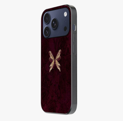 Crimson Fade Butterfly Glass Case photographed in natural light showing reflective finish and design depth.