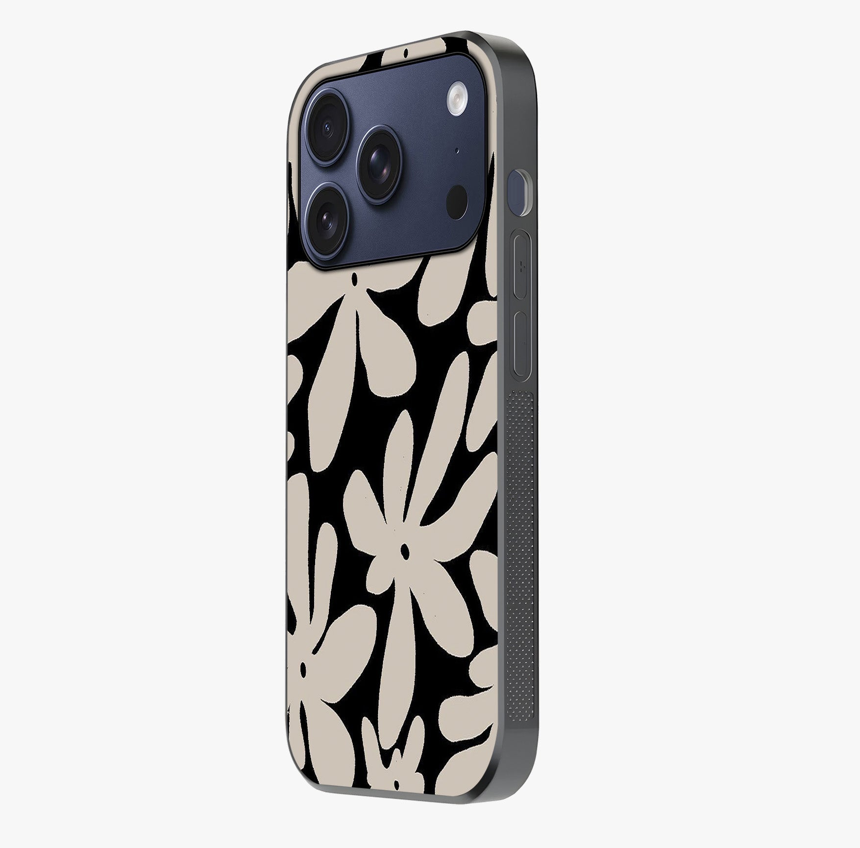 Monochrome Petal Dance Glass Case photographed in natural light showing reflective finish and design depth.