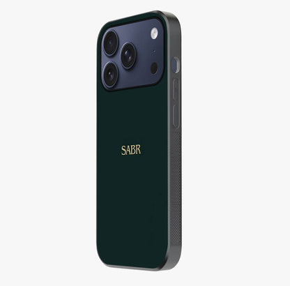 Sabr Minimal Patience Glass Case photographed in natural light showing reflective finish and design depth.