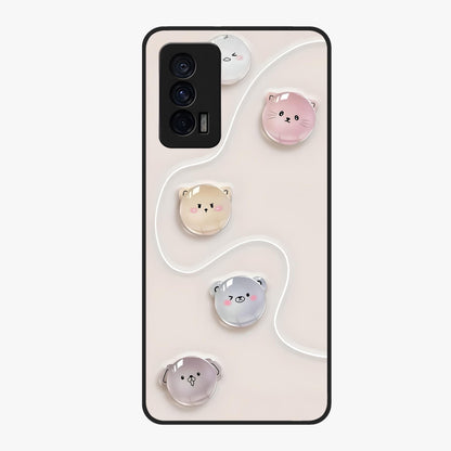 Puffy Face Parade Glass Case showing flat back view with cute puffy character faces artwork and glossy glass finish.