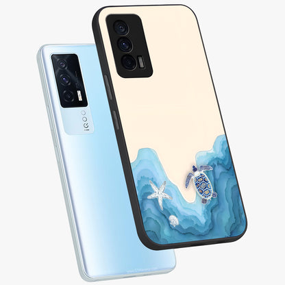Ocean Drift Turtle Glass Case displayed in angled mockup highlighting peaceful ocean turtle illustration with marine aesthetic.